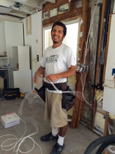 Esteban wiring up the kitchen.