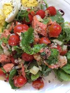 Salad with wild sockeye salmon and eggs.