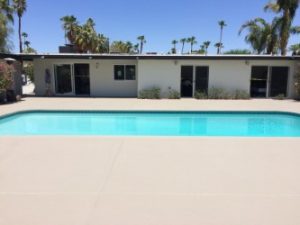 Back of house exterior and new patio stain.